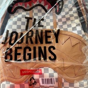 Sprayground Tan and Black Backpack Adventure Essential